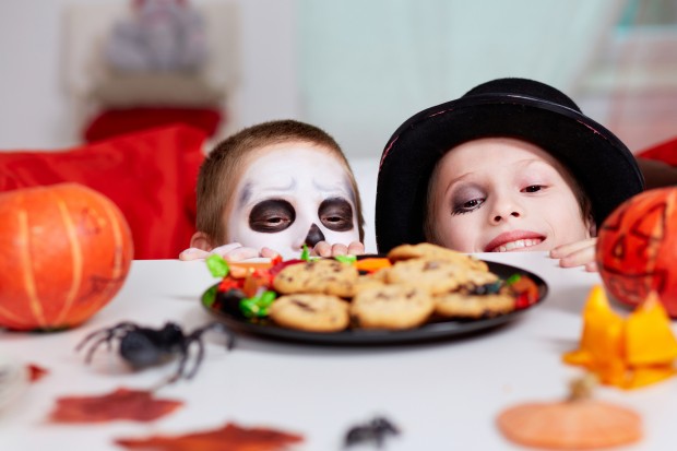 http://www.dreamstime.com/royalty-free-stock-photo-halloween-treats-photo-two-eerie-boys-looking-cookies-table-image30954105